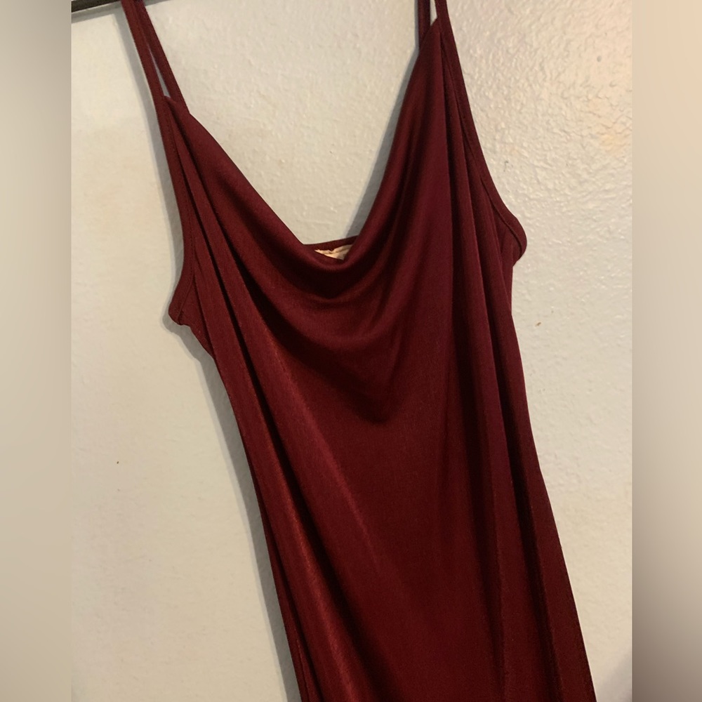 His is a maroon formal dress